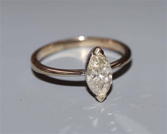 A modern 18ct white gold and solitaire marquise cut diamond ring, size O.